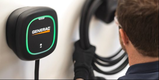 Home EV charger mounted on a wall